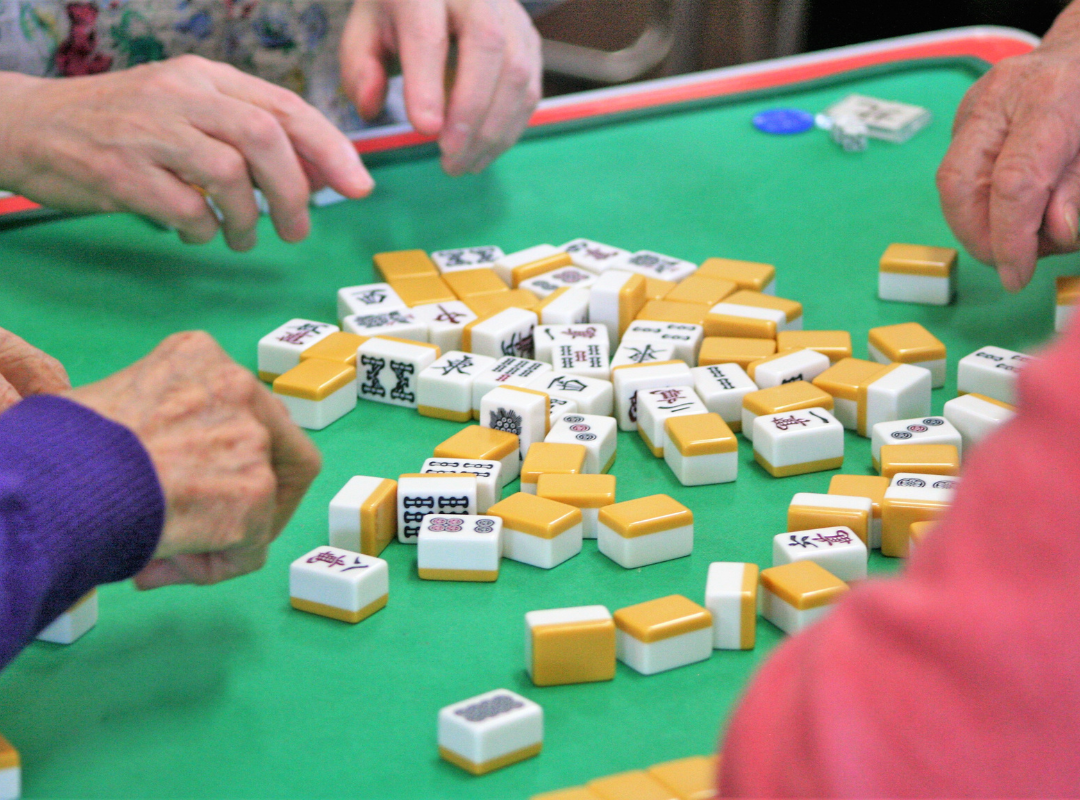 Photograph of various colored yarn stacked on top of one another