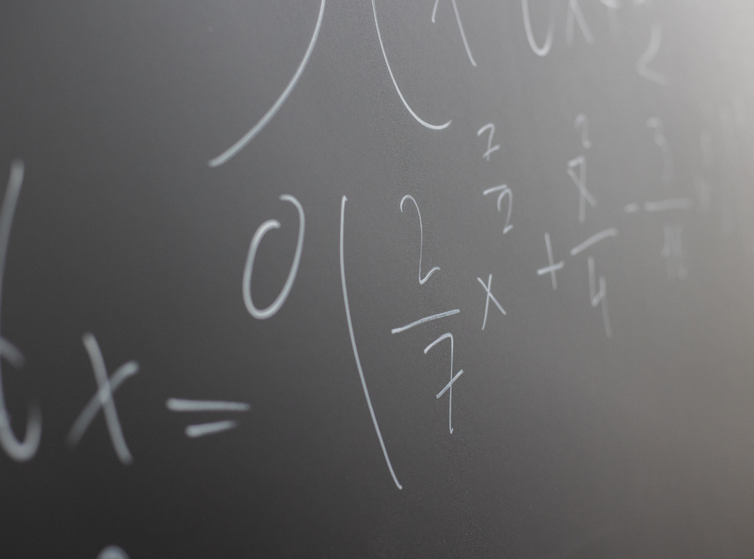 Photograph of various colored yarn stacked on top of one another