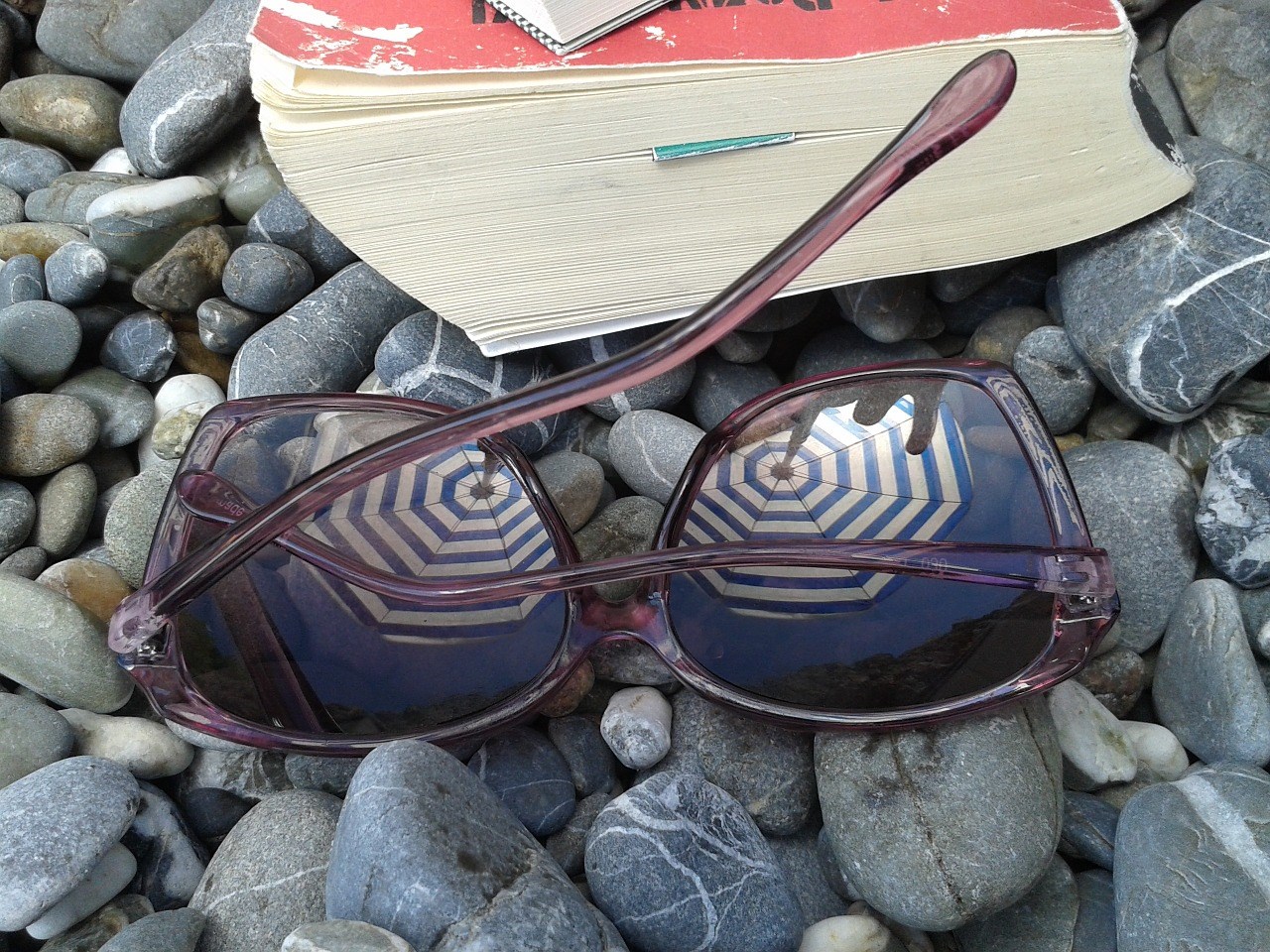 Summer beach read book sunglasses rocks outside outdoors vacaltion Summer beach read book sunglasses rocks outside outdoors vacaltion