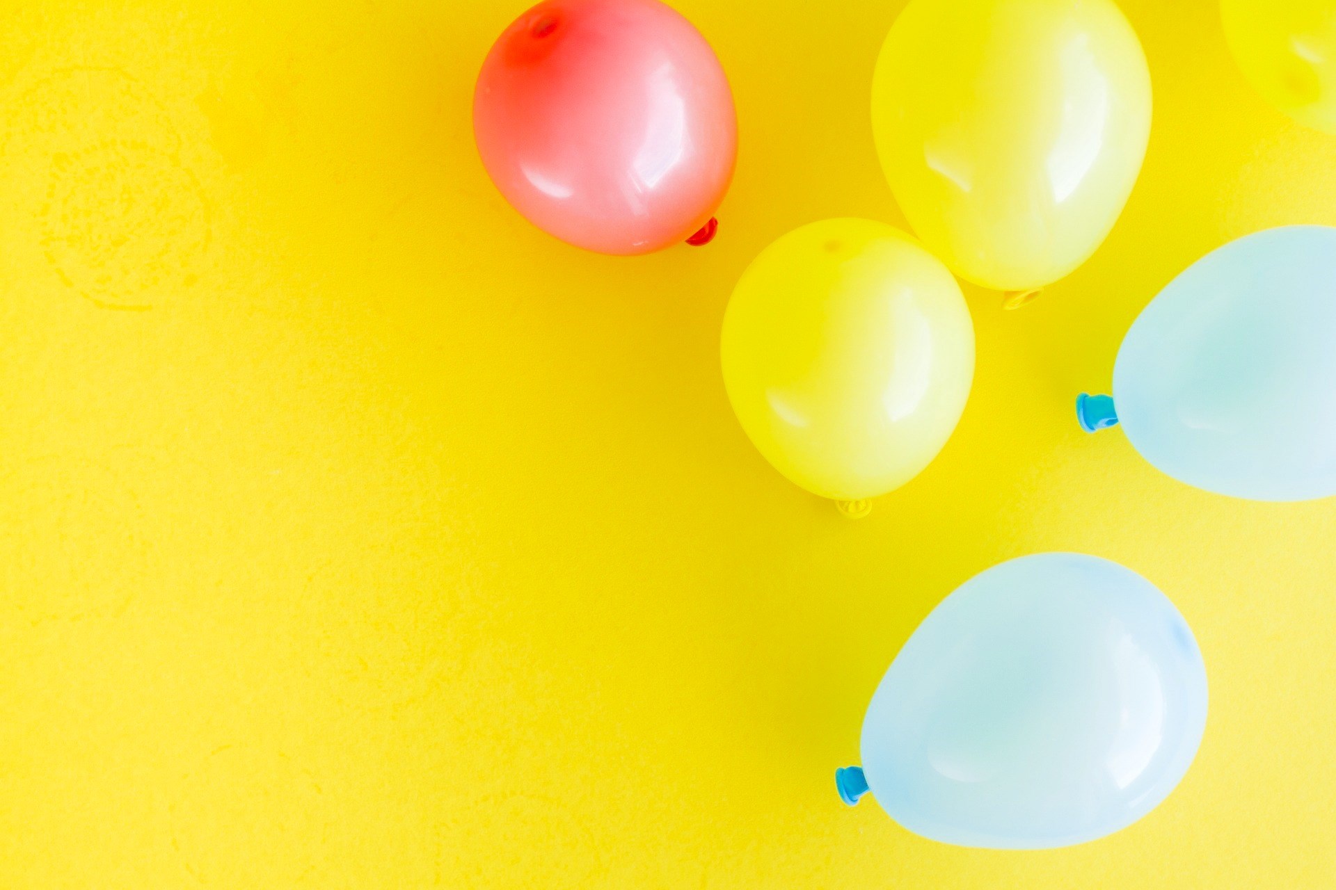 Birthday party balloons yellow background fun happy cheerful kids