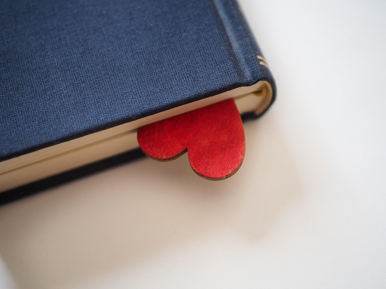 Heart Shape in a Book on White Background
