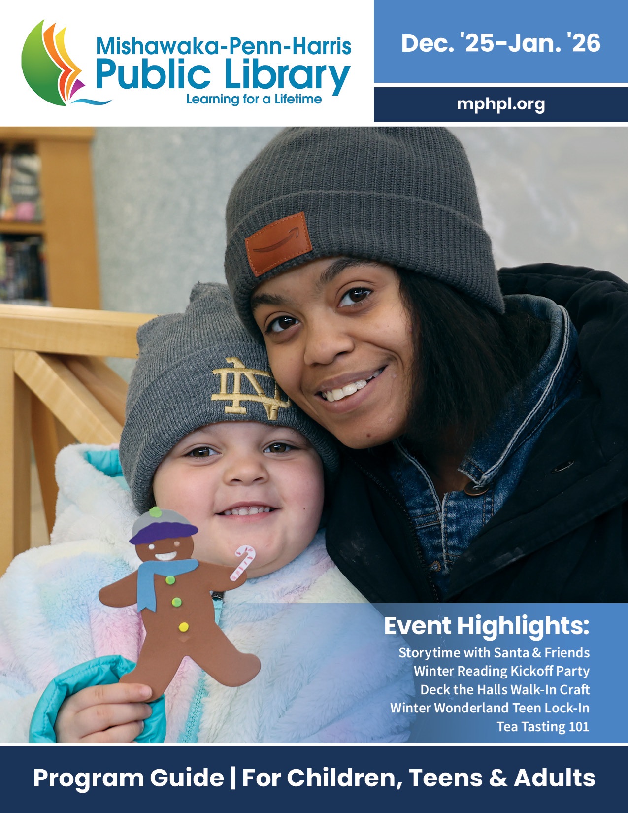 A mother and child wearing winter hats smile warmly indoors at the Mishawaka Library. The child holds a gingerbread man. Mishawaka-Penn-Harris Public Library event details are on the right.