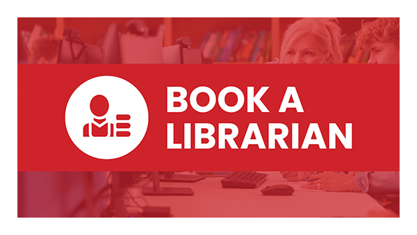 Book a Librarian Logo. A woman pointing to a computer screen as she helps a male seated in front of the computer.