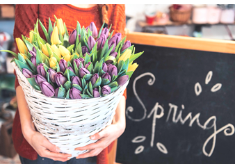 Woman Holding Basket of Flowers