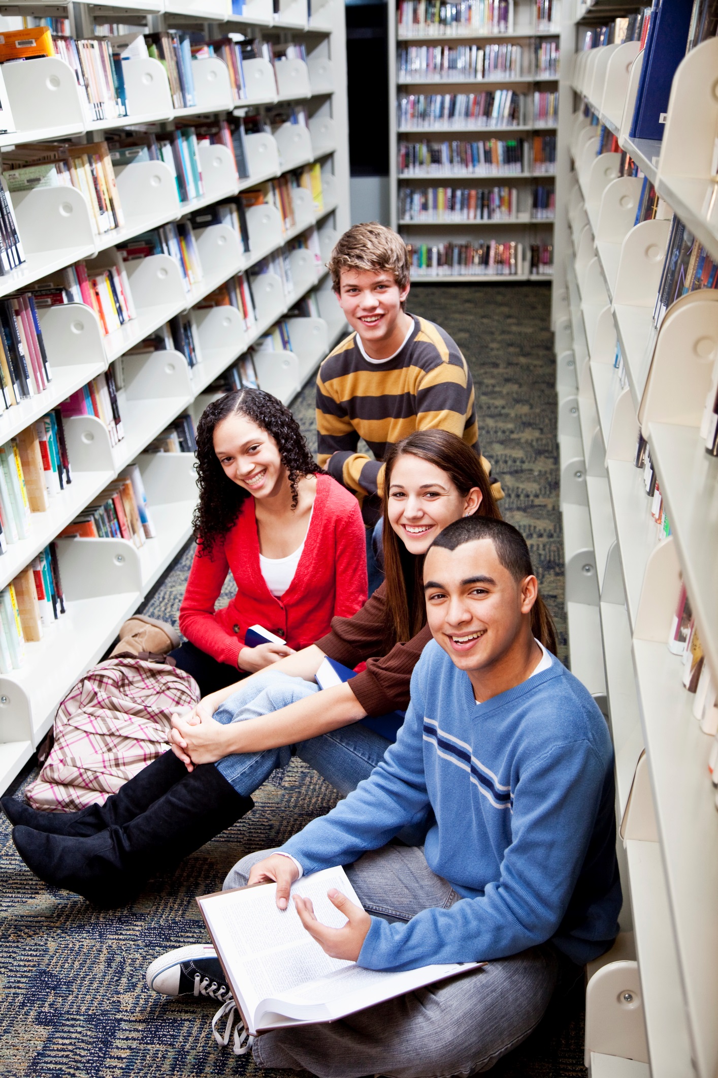 Teenage Students Hanging Out in Library