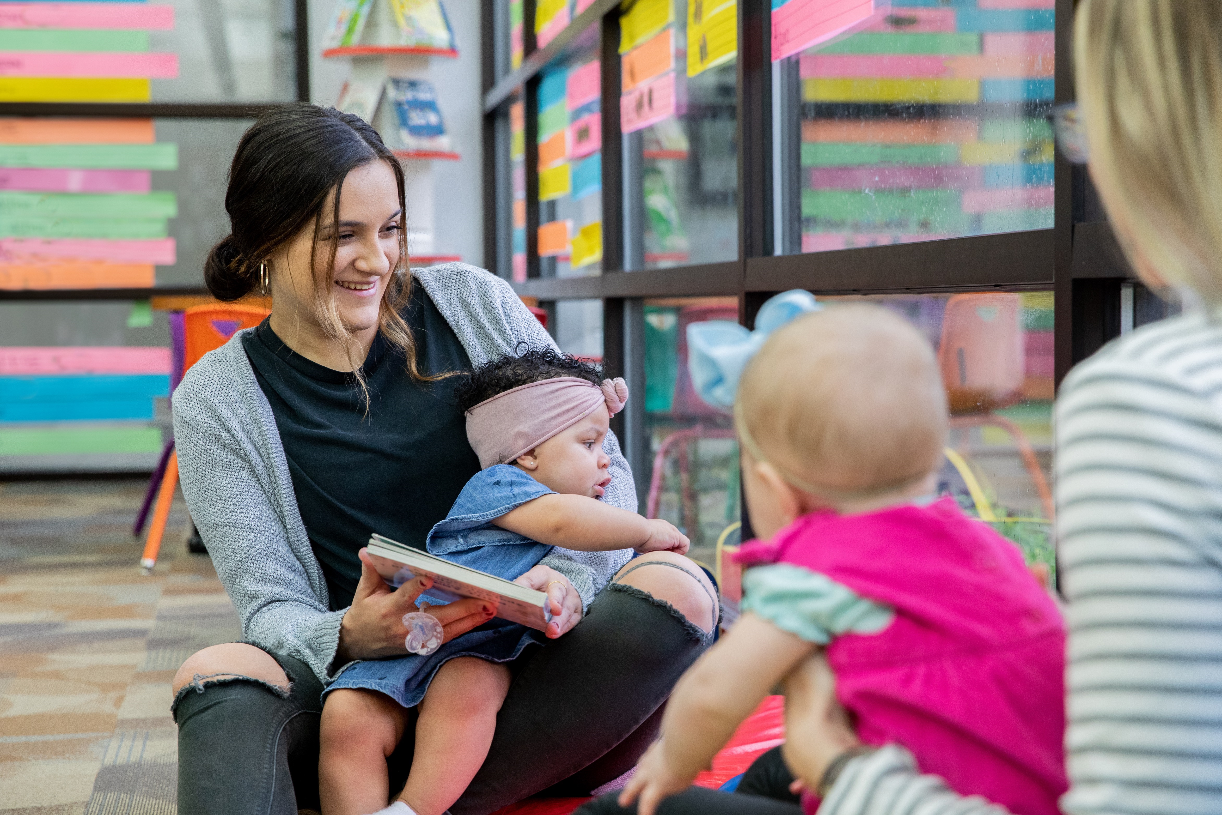 Mother Having Storytime With Babies