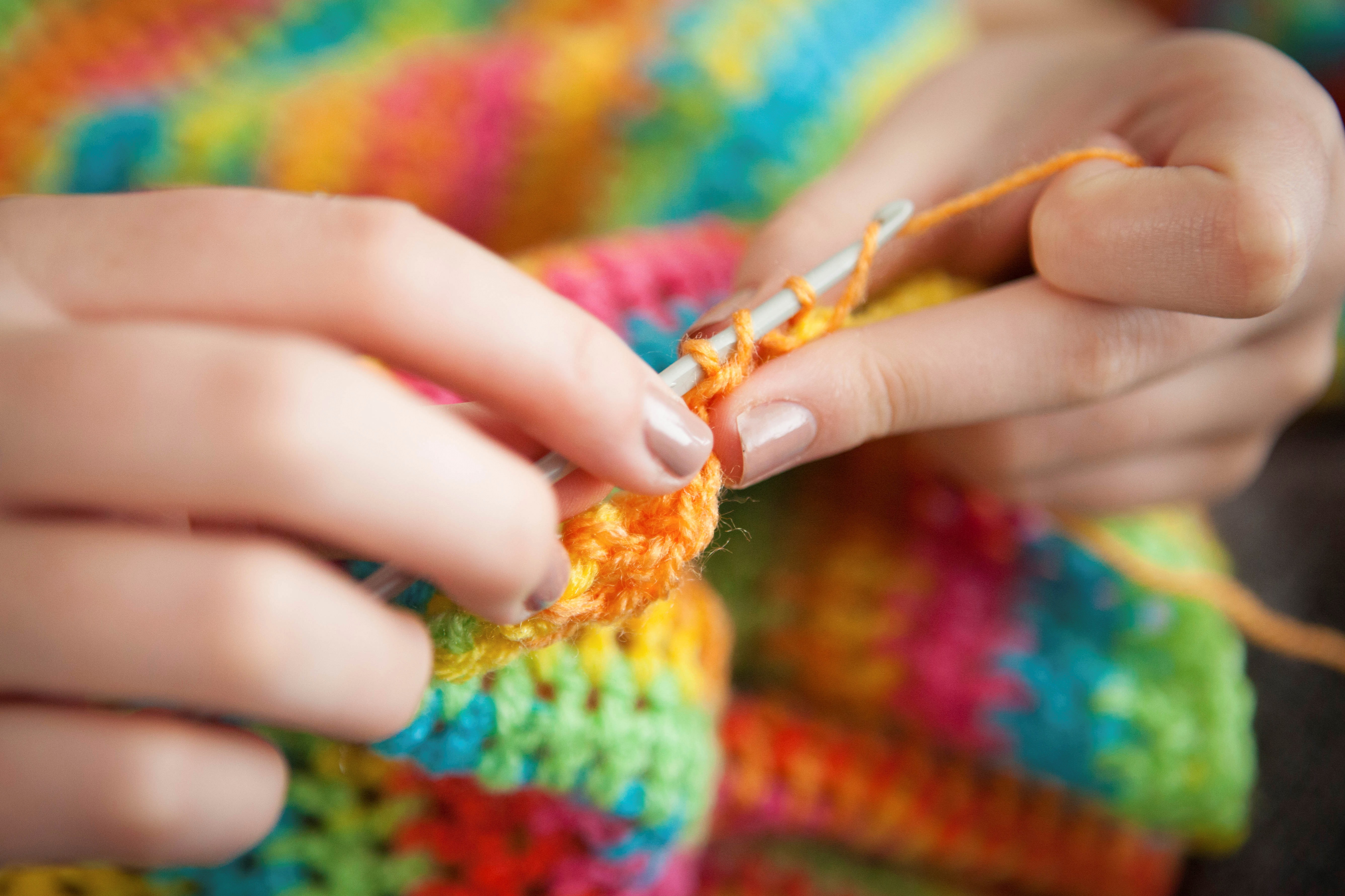 Woman Crocheting a Blanket