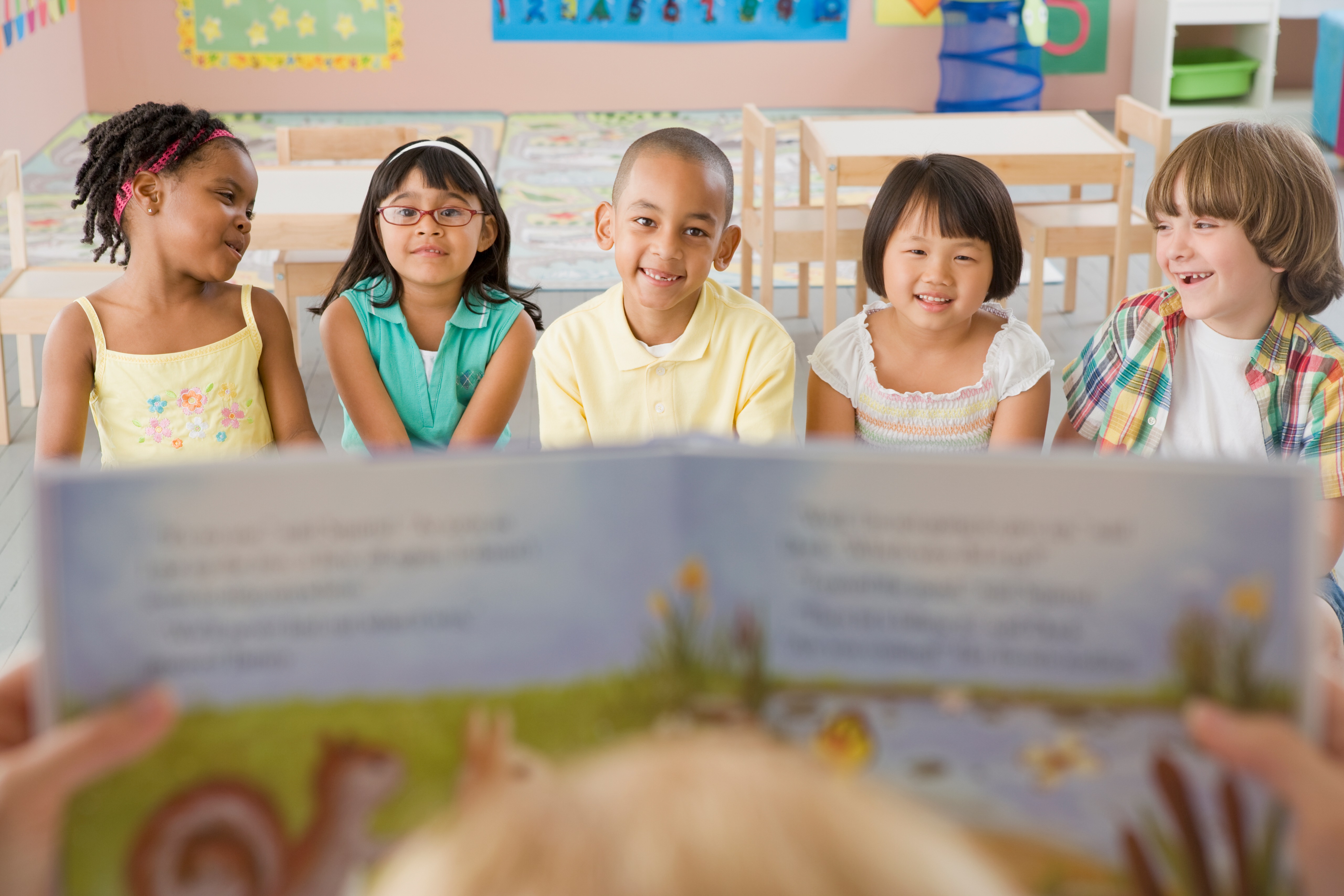 Group of School Children Listening to Story