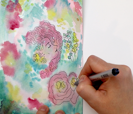 Example of reverse colouring and a hand with a marker. 