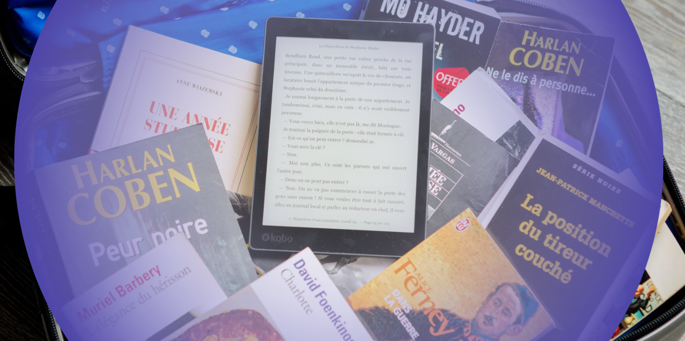 Pile of books with an ereader on top in the centre. 