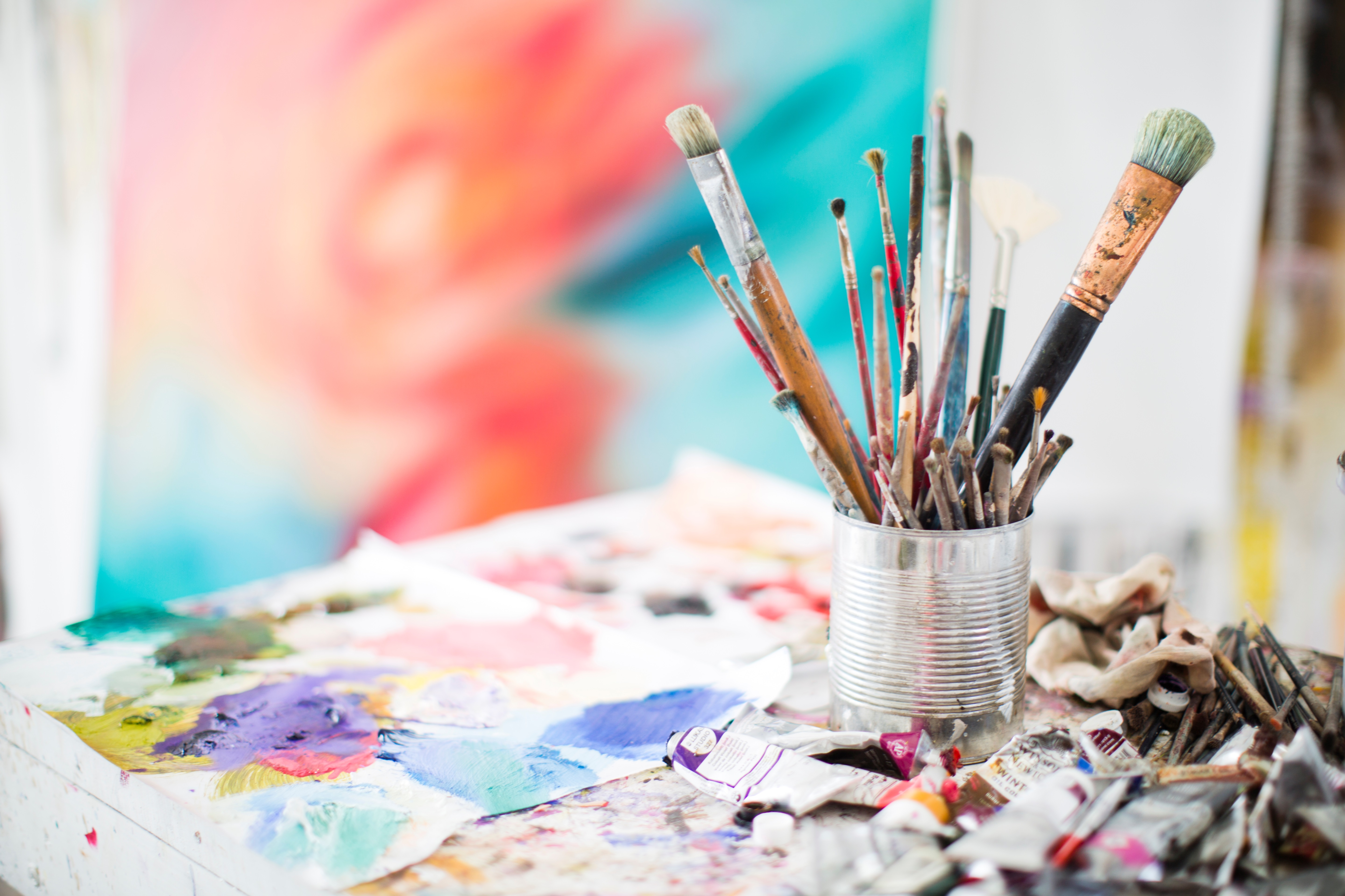 Paints and Paint Brushes in an Artists Studio