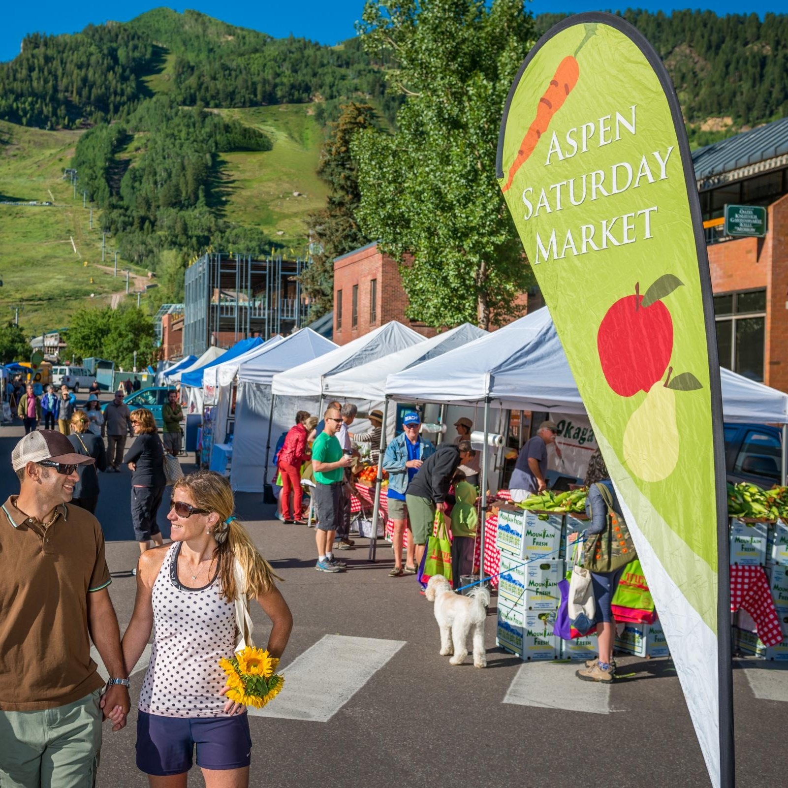 People walking through Aspen Farmers Market