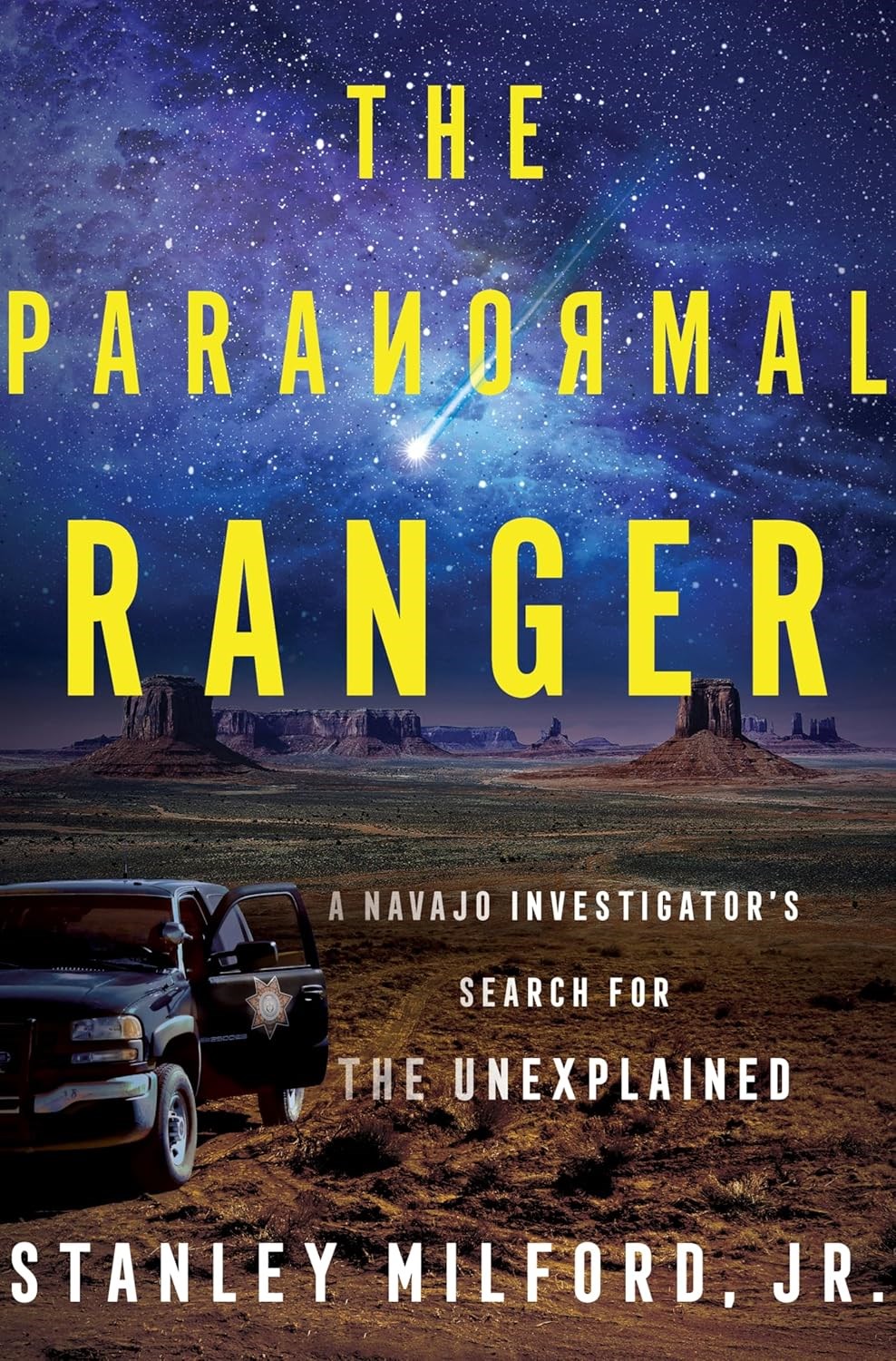 The Paranormal Ranger by Stanley Milford Jr. A Navajo investigator's truck parked in the middle of the desert. There is a starry sky with a comet streaking across. The Paranormal Ranger by Stanley Milford Jr. A Navajo investigator's truck parked in the middle of the desert. There is a starry sky with a comet streaking across.