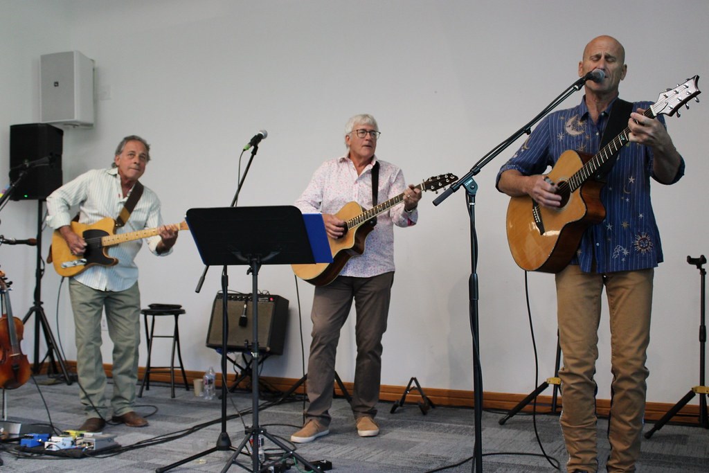 Mack Bailey Rich Ganson and Randall Utterback playing music
