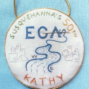 Embroidered logo for Susquehanna's 50th year in the EG
