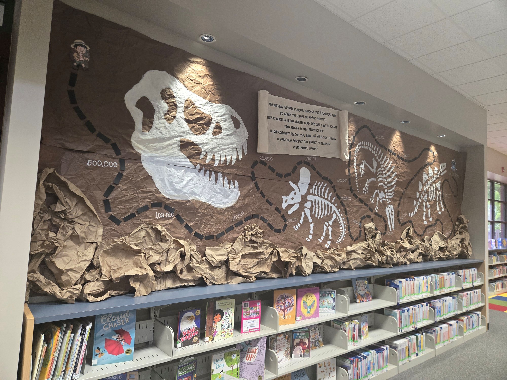 Clute Branch Summer Reading Challenge Dinosaur display for tracking reading minutes
