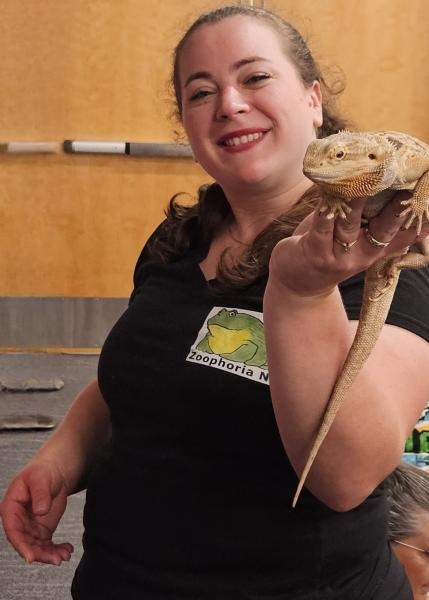 Zoophoria person holding animal
