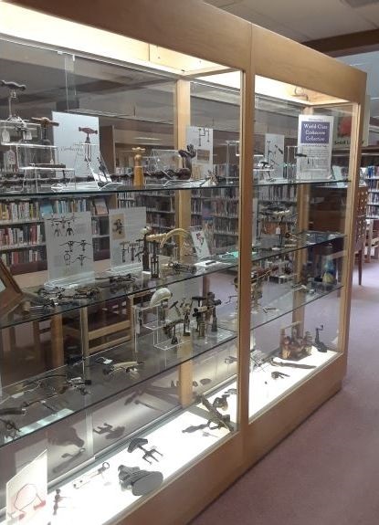Corkscrews in glass cases