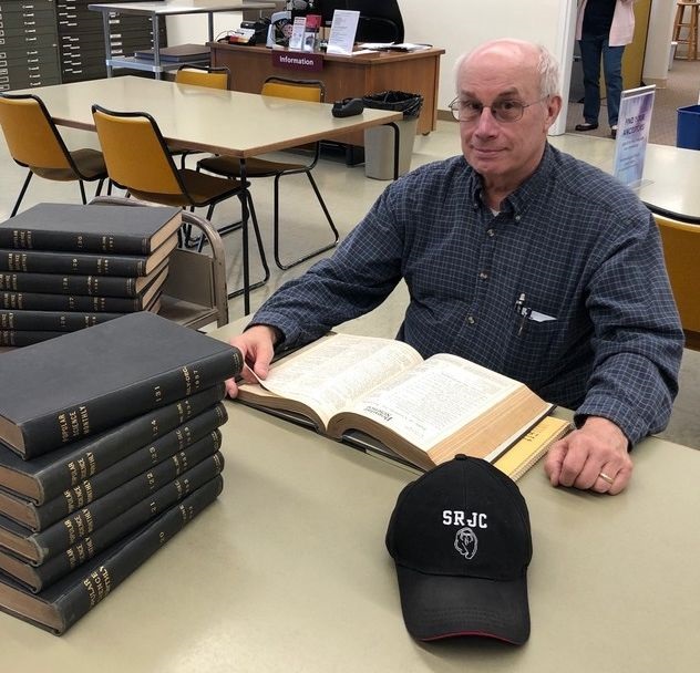 Dr. David Lightfoot seated at desk