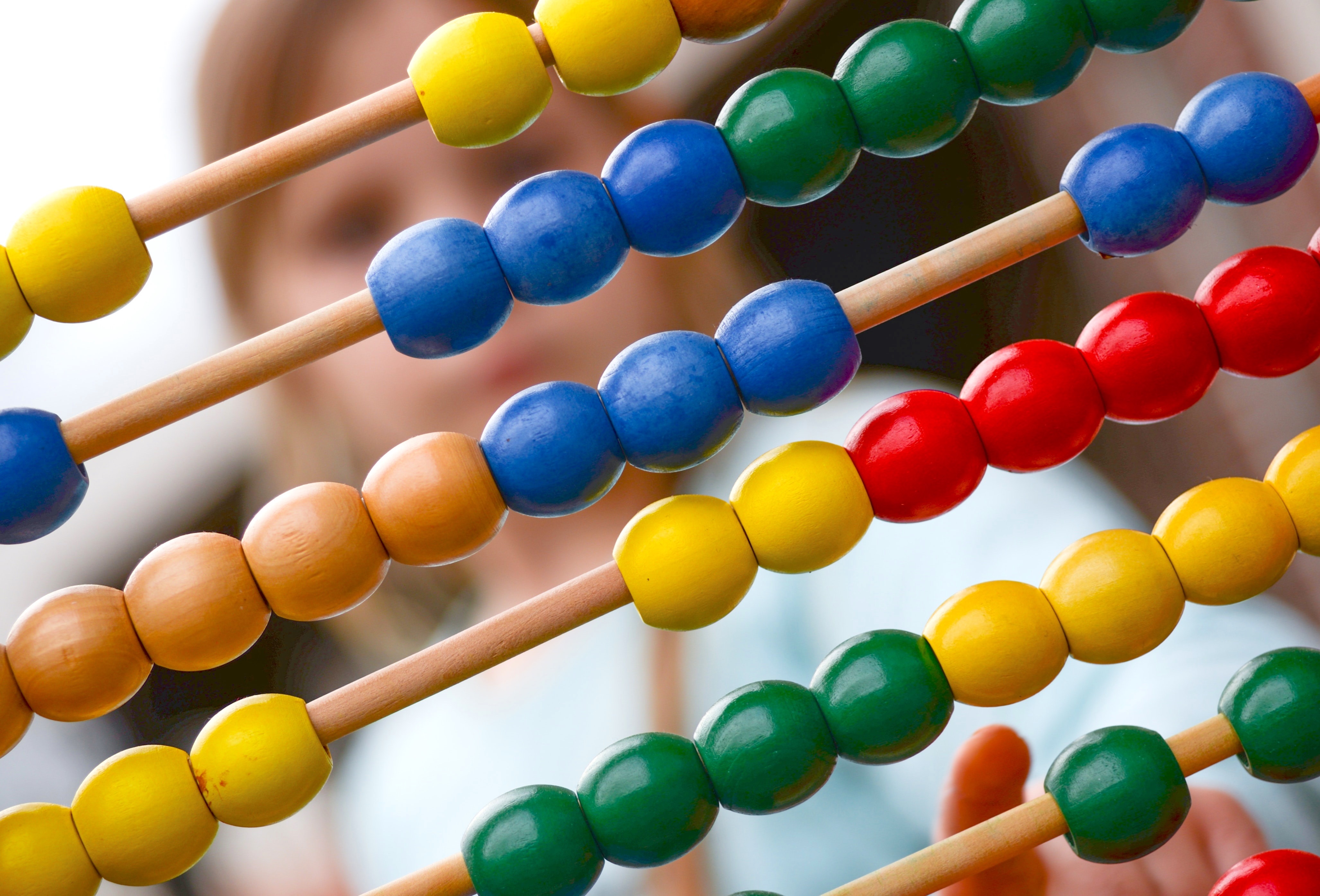 Colorful abacus with red, blue, yellow, and green beads