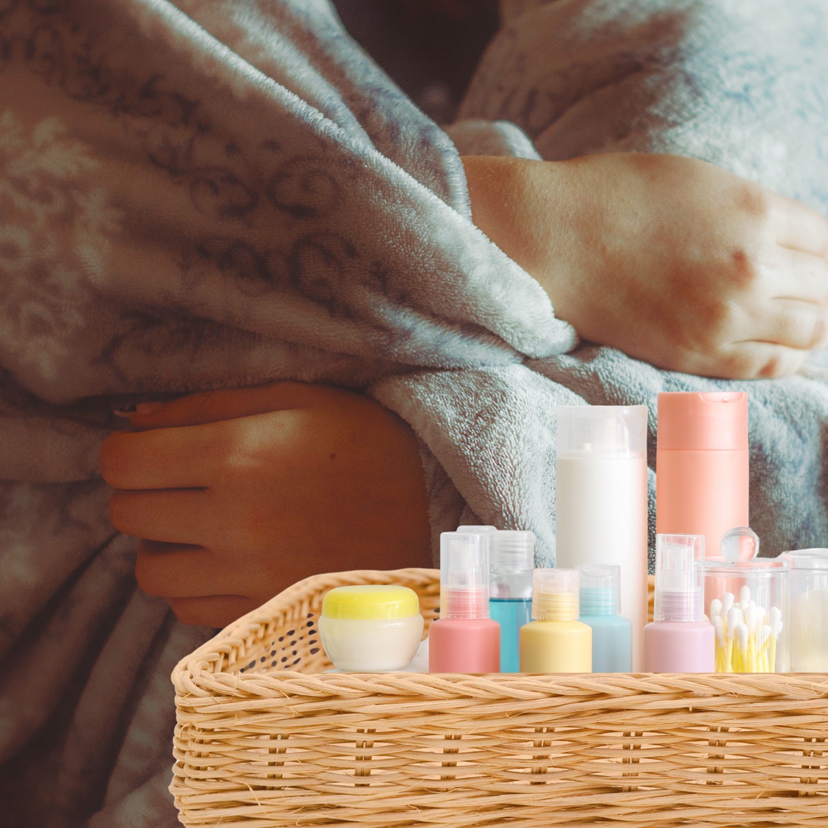 teen-wrapped-in-a-blanket-and-a-care-kit-in-a-wicker-basket