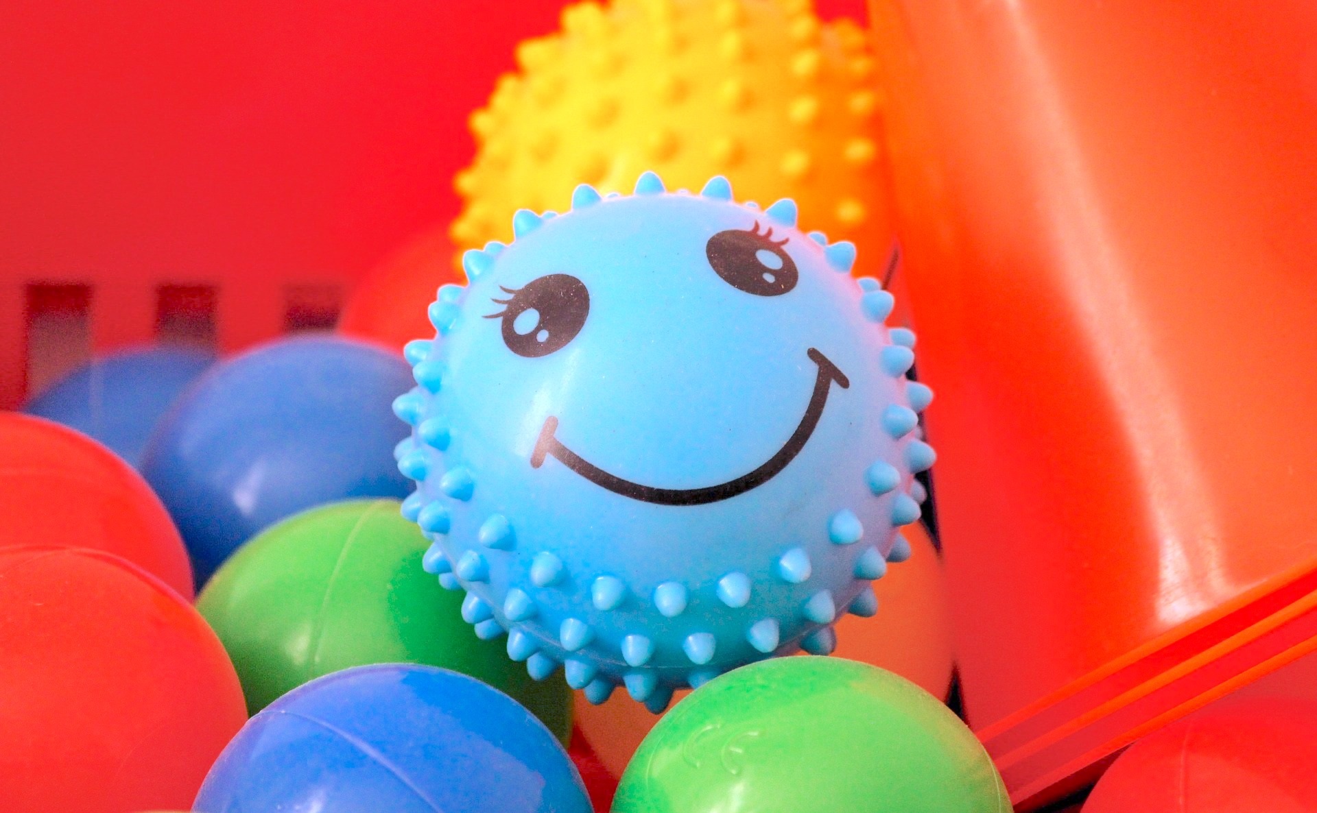 Small blue ball with a smiley face