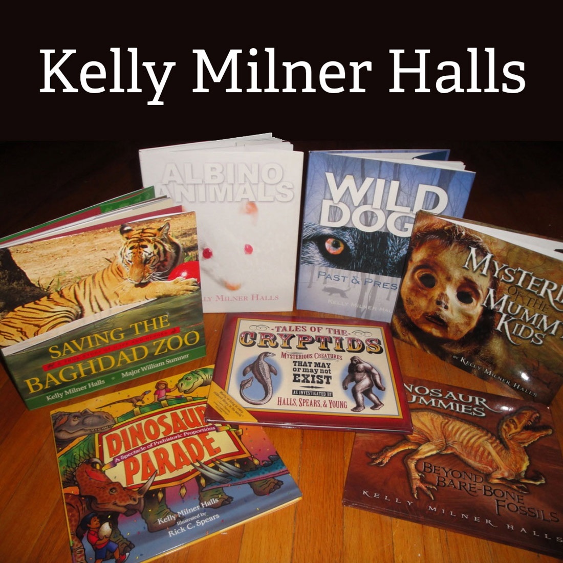 Several books on a table, by Kelly Milner Halls