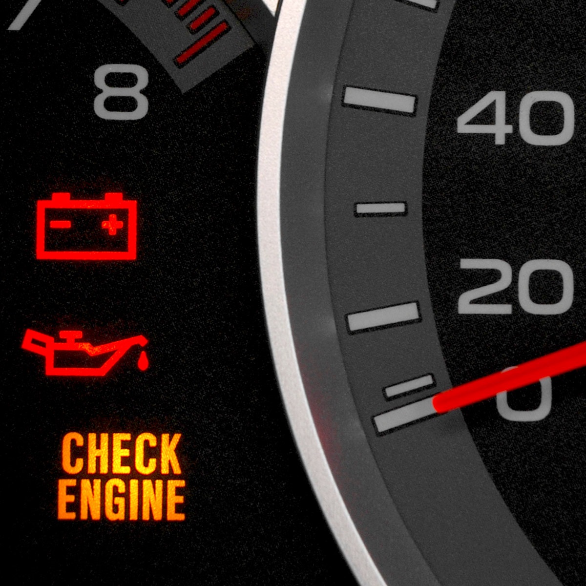 Speedometer next to a check engine light