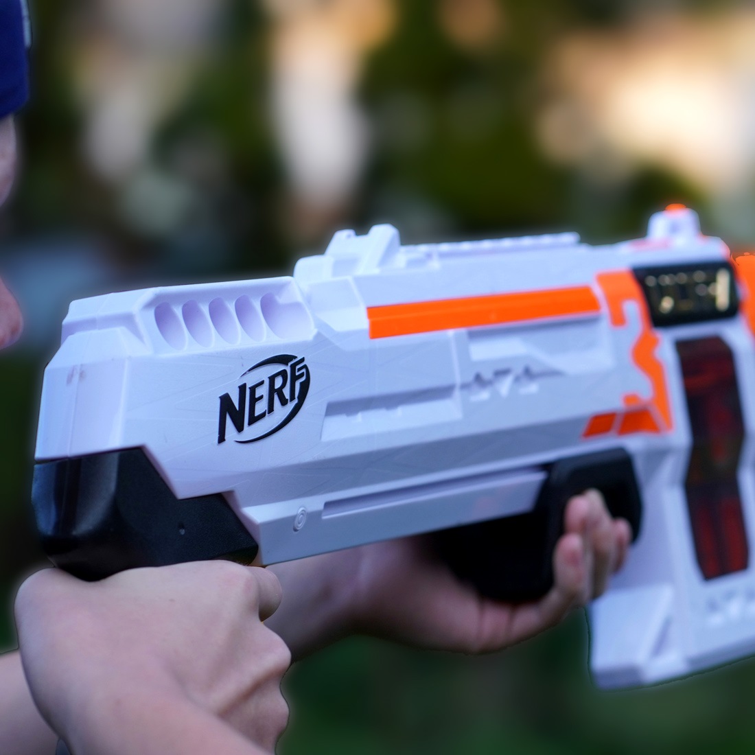 Nerf guns with the words, "Nerf Battle" overlaying them