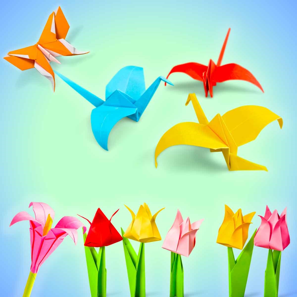 Image depicts origami cranes and flowers.