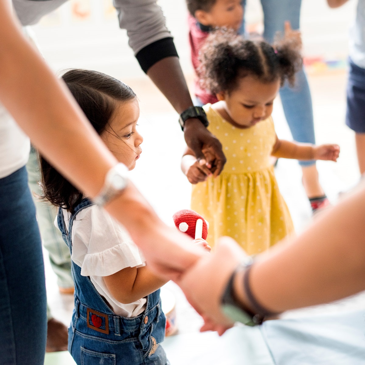 Toddler and parents at Music and Movement