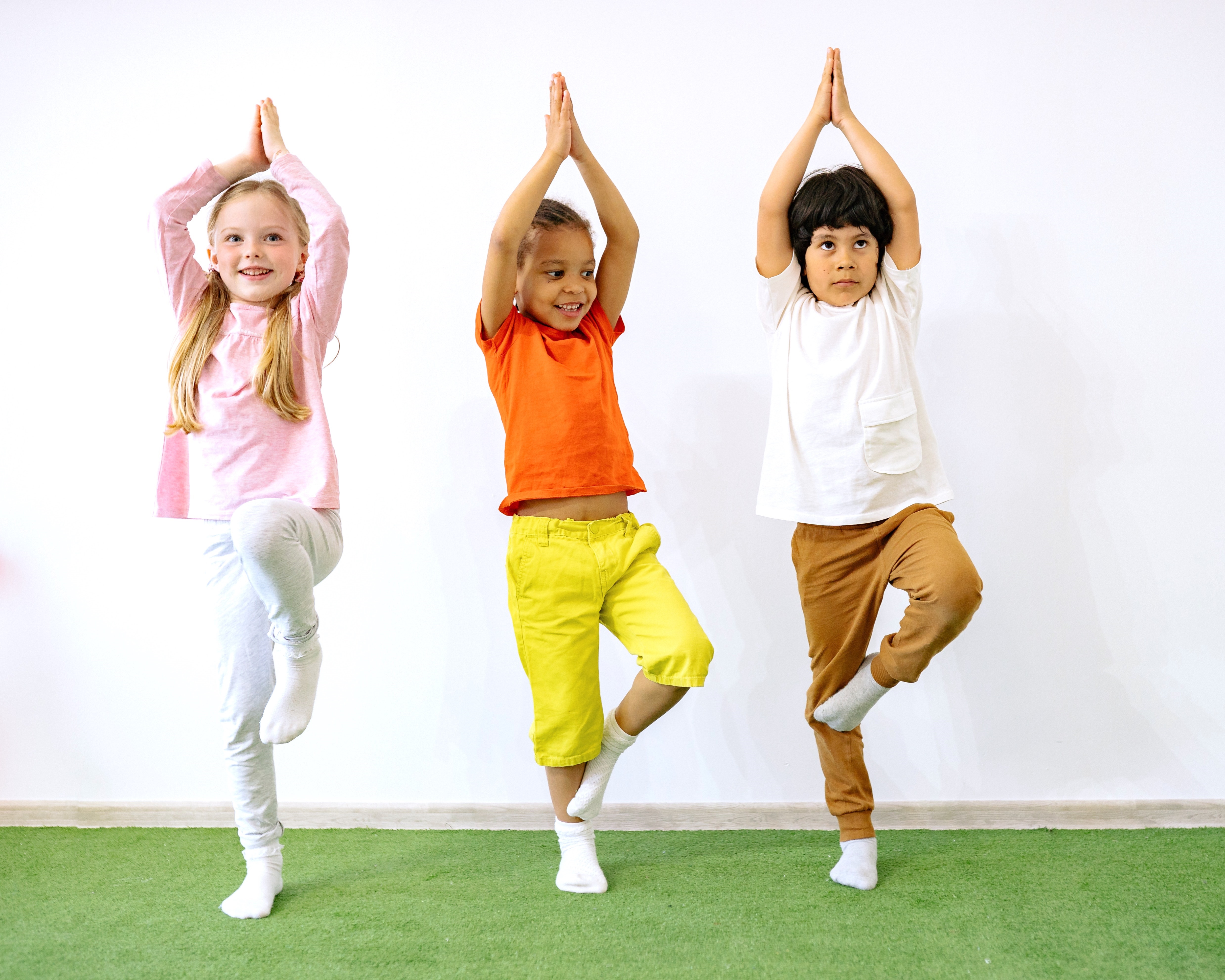 Three Kids Doing a Yoga Pose