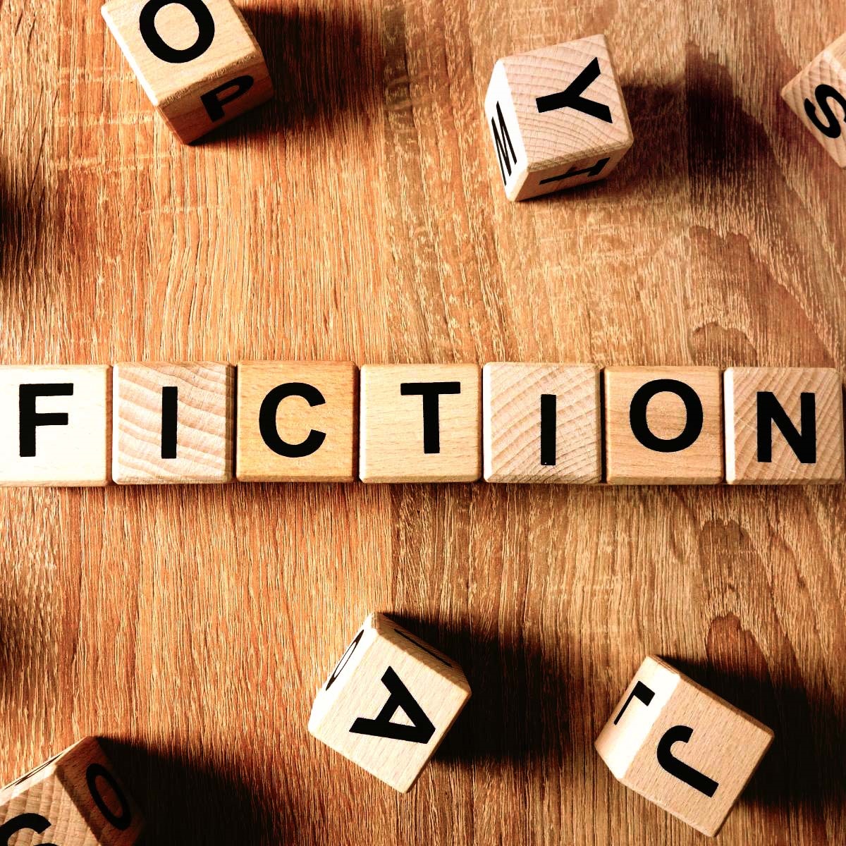 Scrabble tile spelling out Fictionology