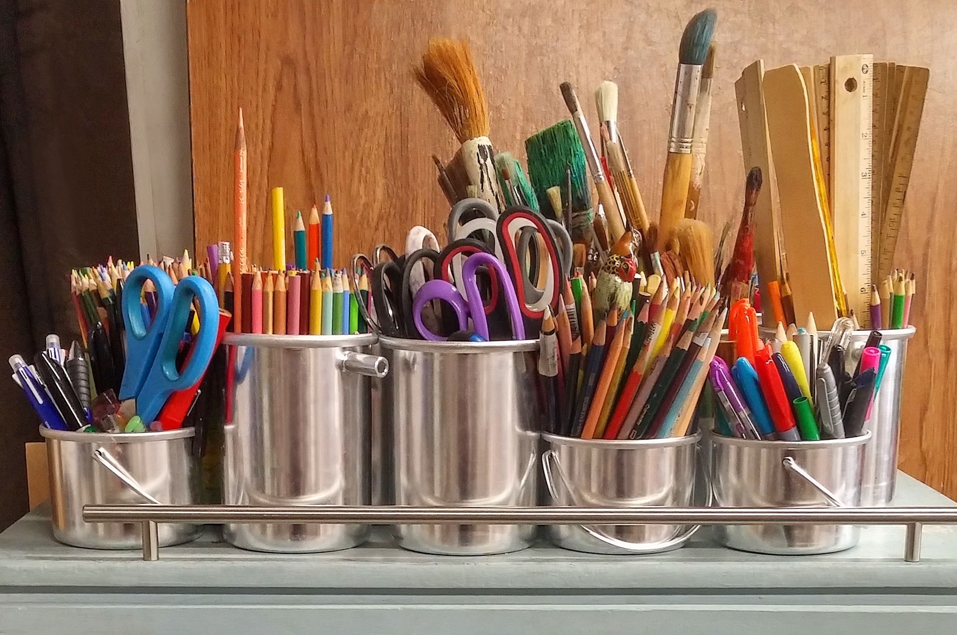 Various Art Supplies in Cans
