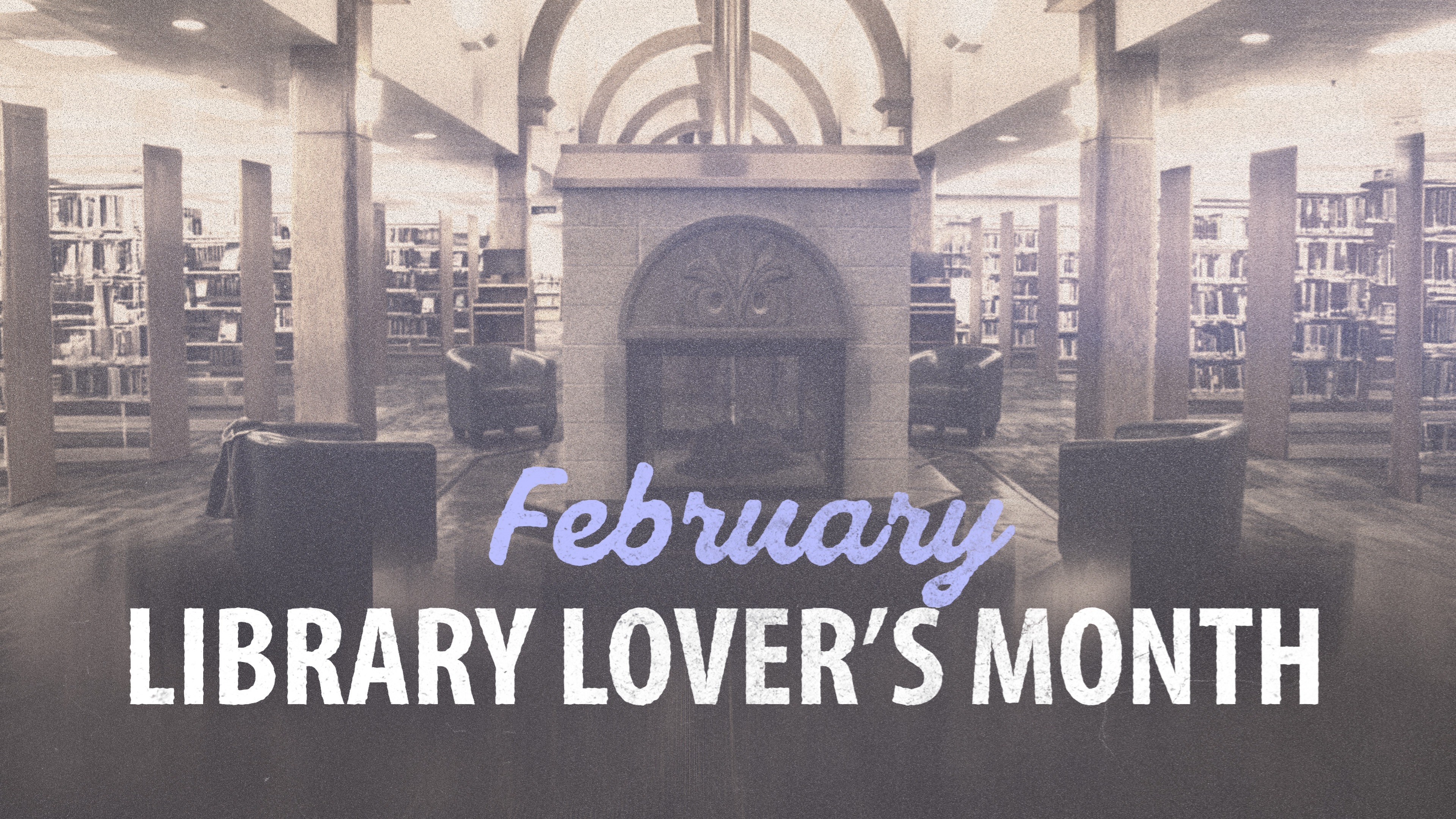 A library with a large fireplace and seating. February Library Lover's Month.
