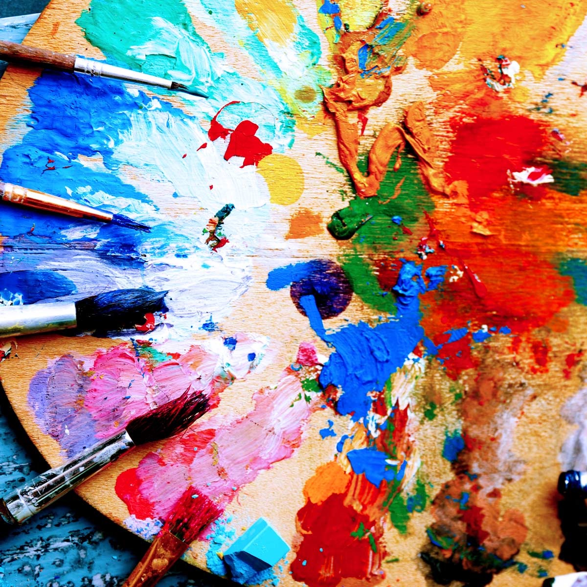 Paint palette covered in paints