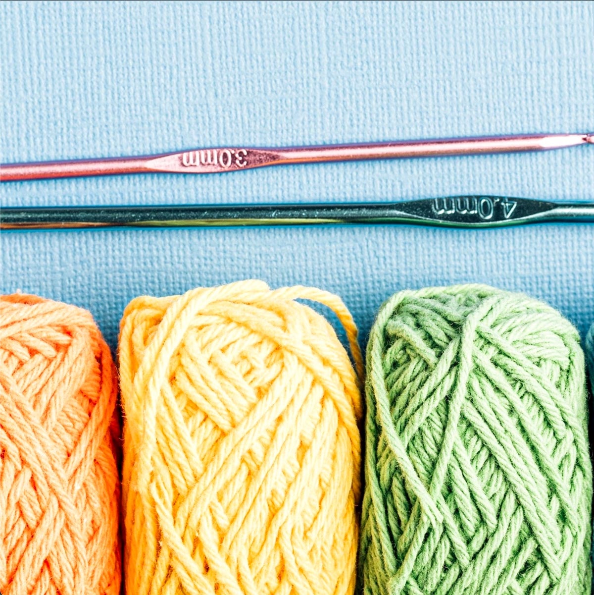 Crochet hooks and 3 skein of yarn.