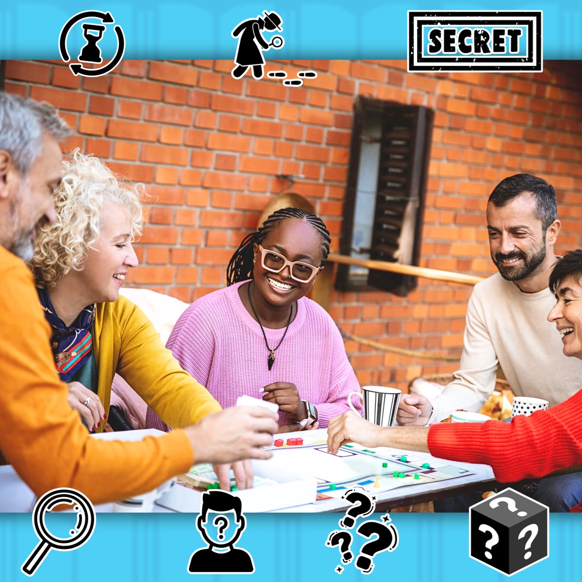 a group of people sit around a table playing a board game.